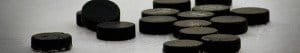 FI hockey puck 608582 640